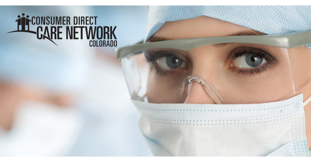 Female nurse's face with her surgical mask on.